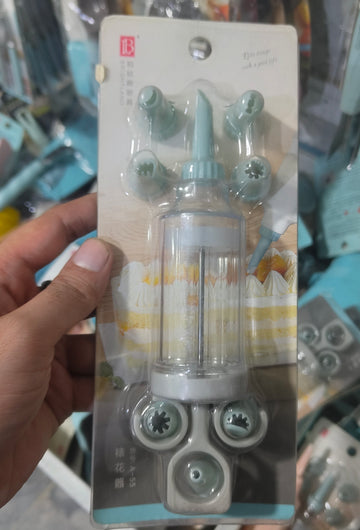 Cake icing machine.
