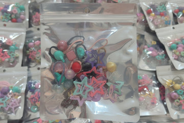 Star pin and ponny pouches.